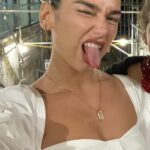 She loves to stick her tongue out... Always giving random blowjobs around... Dua lipa