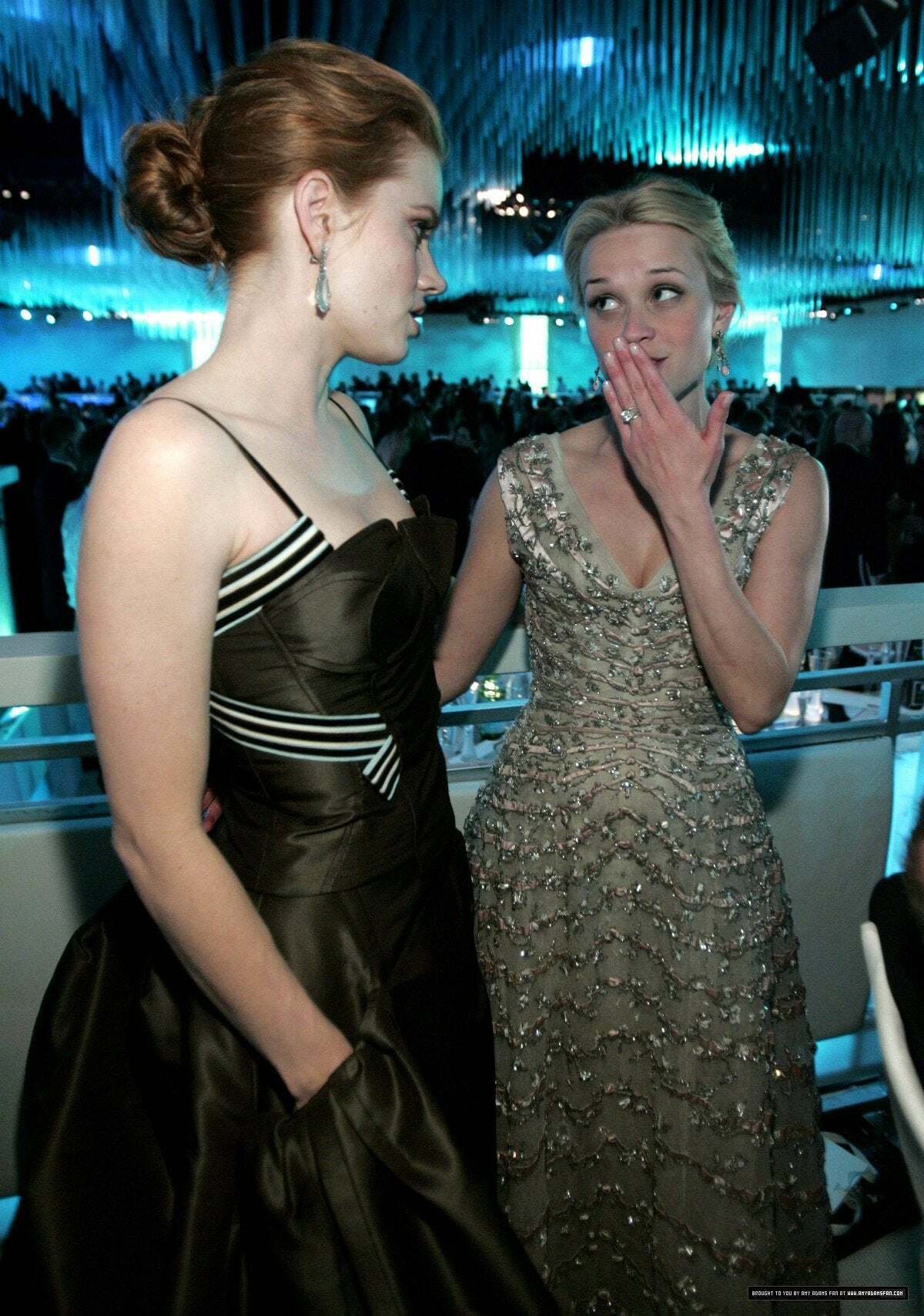 Reese Witherspoon trying to convince Amy Adams they should swap their younger boyfriends.