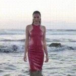 Gal Gadot looks good with a wet dress clinging to her tight body