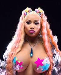 i want Nicki Minaj’s tits in my face as she rides me