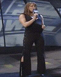 Any WWE fans remember this classic moment? Stephanie McMahon teases her body in front of crowd during Playboy announcement.