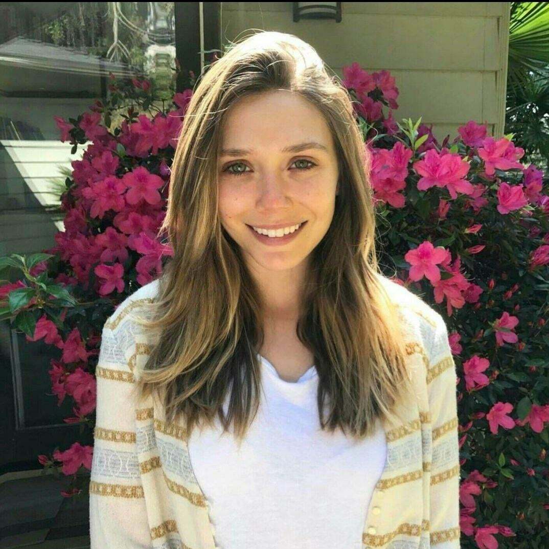 I just want to cum on Elizabeth Olsen's cute face