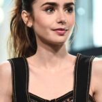 I want to cover Lily Collins cute face with warm cum so bad