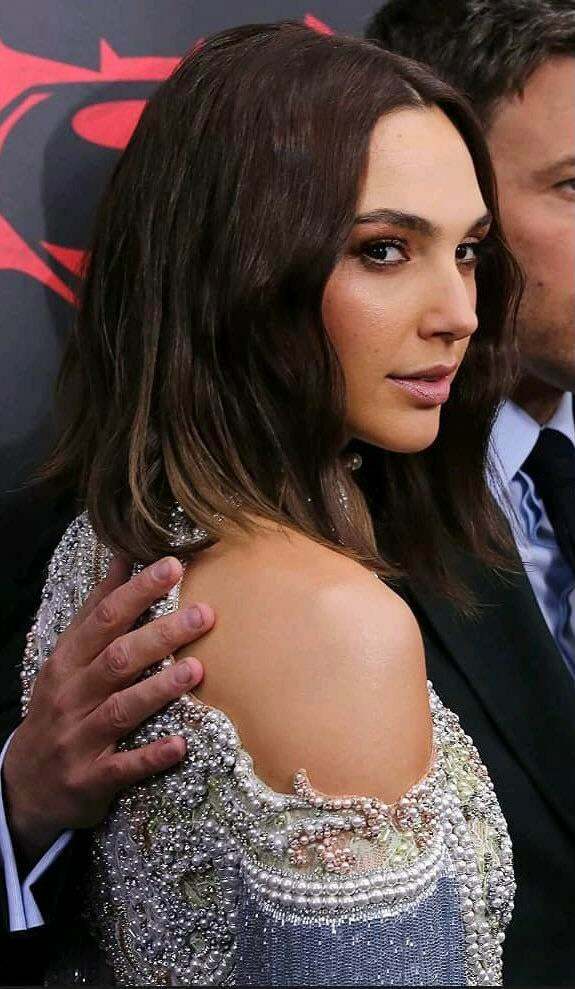 At the premiere, Gal Gadot sets her eyes on who she’s taking home…