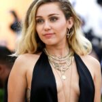 Miley Cyrus just needs that top pulling open