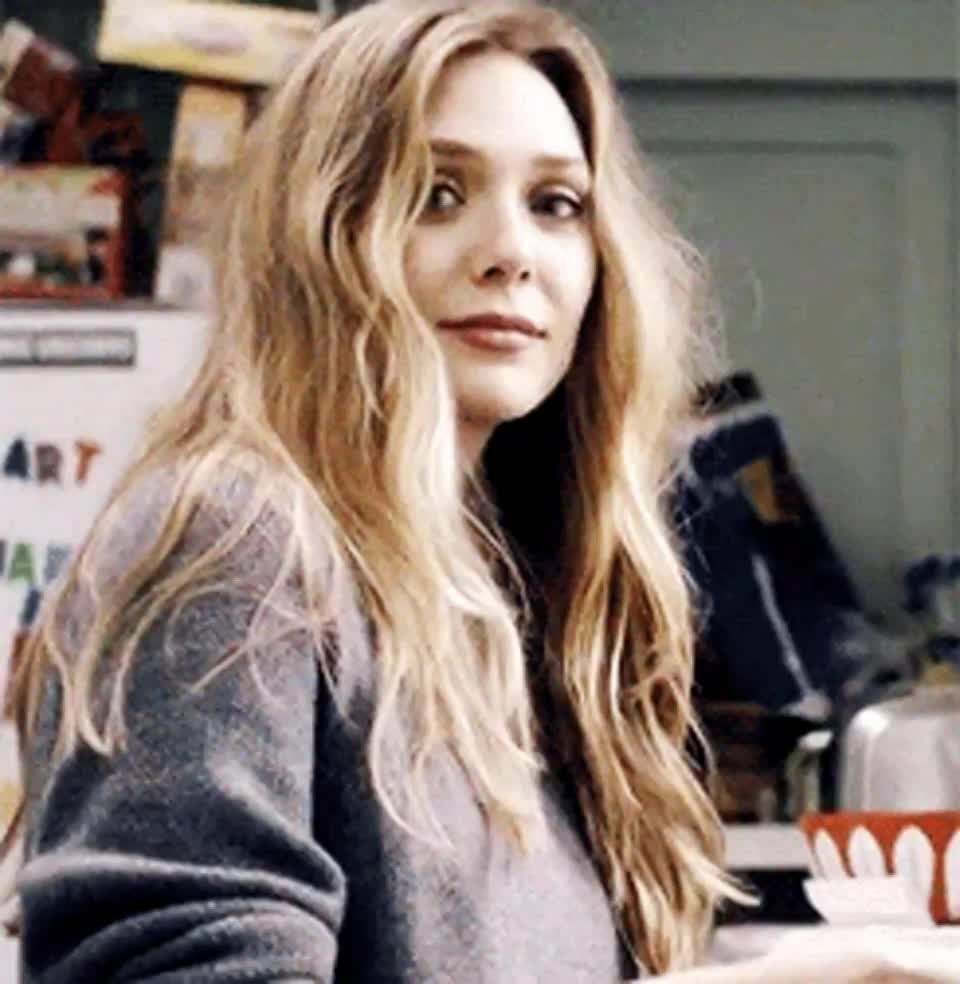 Elizabeth Olsen looking right into your eyes as you stroke