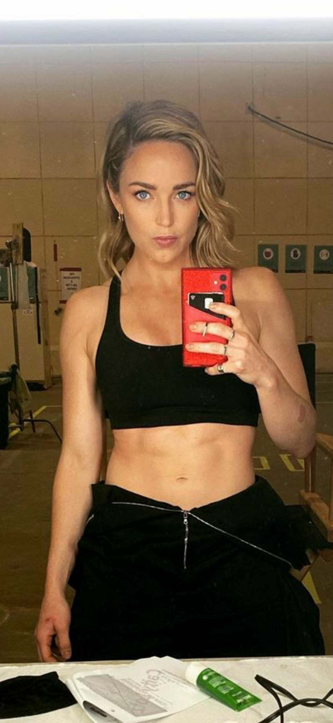 Need to get off to tight abs like Caity Lotz's with a bud
