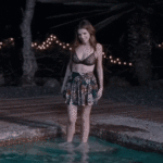 Anna Kendrick walking into the pool