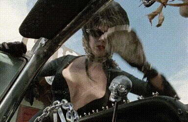 Cassandra Petersons breast on the windshield Elvira Mistress of