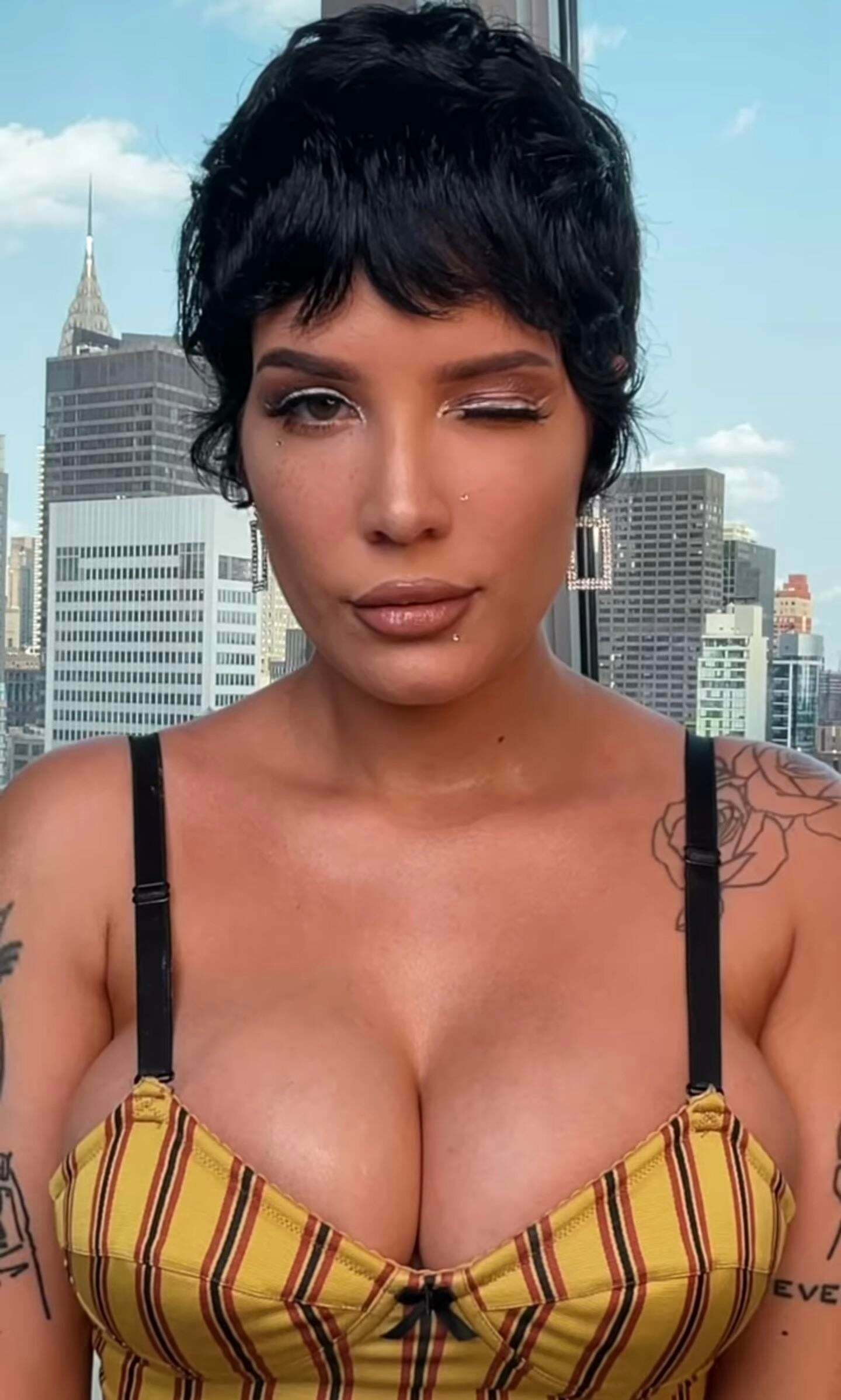 Halsey winking at you with her big cleavage