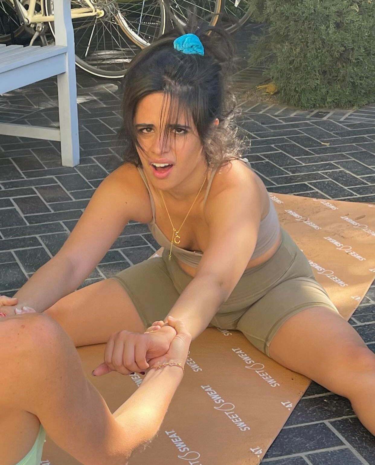 Camila Cabello stretching out