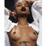 Slick Woods Topless & Sexy (10 Photos)