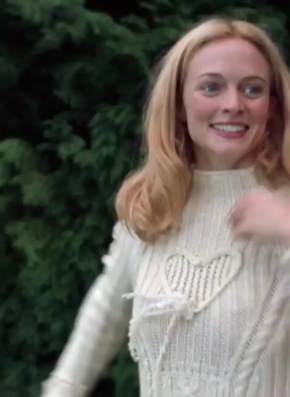 Heather Graham stripping with a chipper attitude