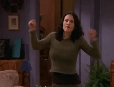 Courteney Cox shaking her plots in Friends