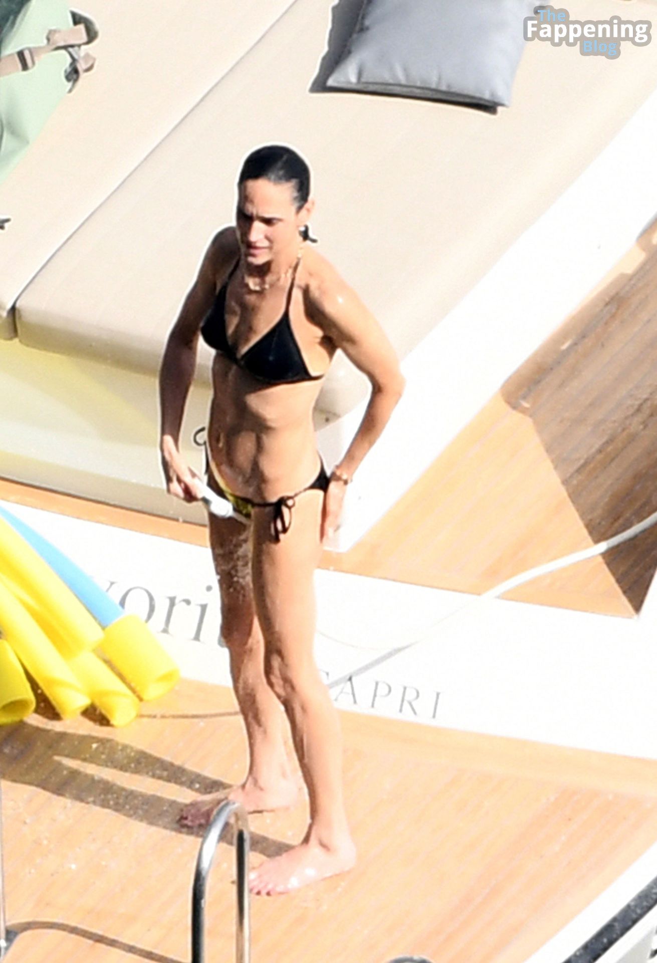 Jennifer Connelly Shows Off Her Toned Bikini Body While Enjoying.jpg
