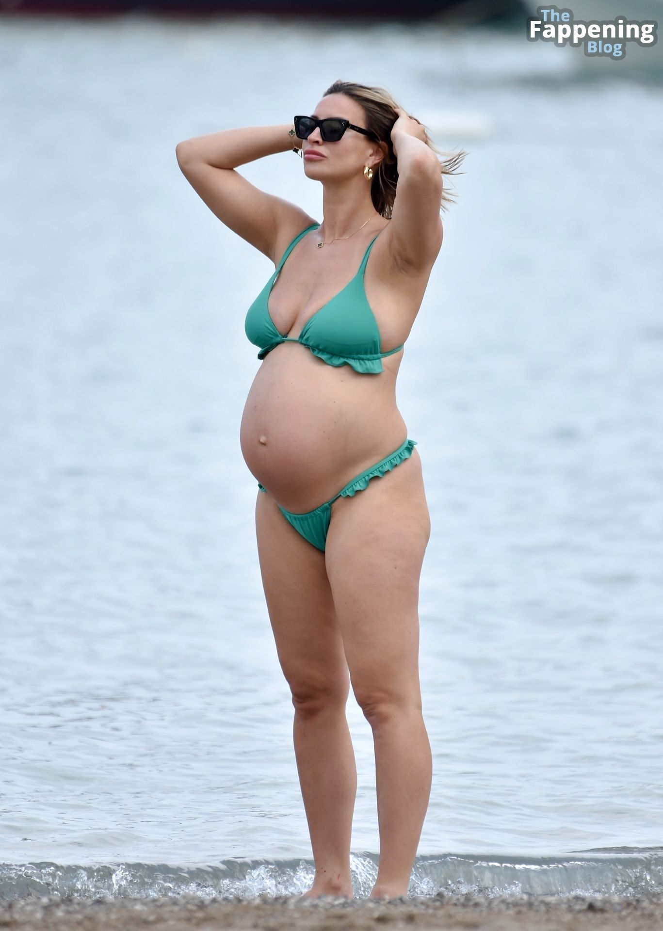 Ferne McCann Flaunts Her Blossoming Belly in a Green Bikini.jpg