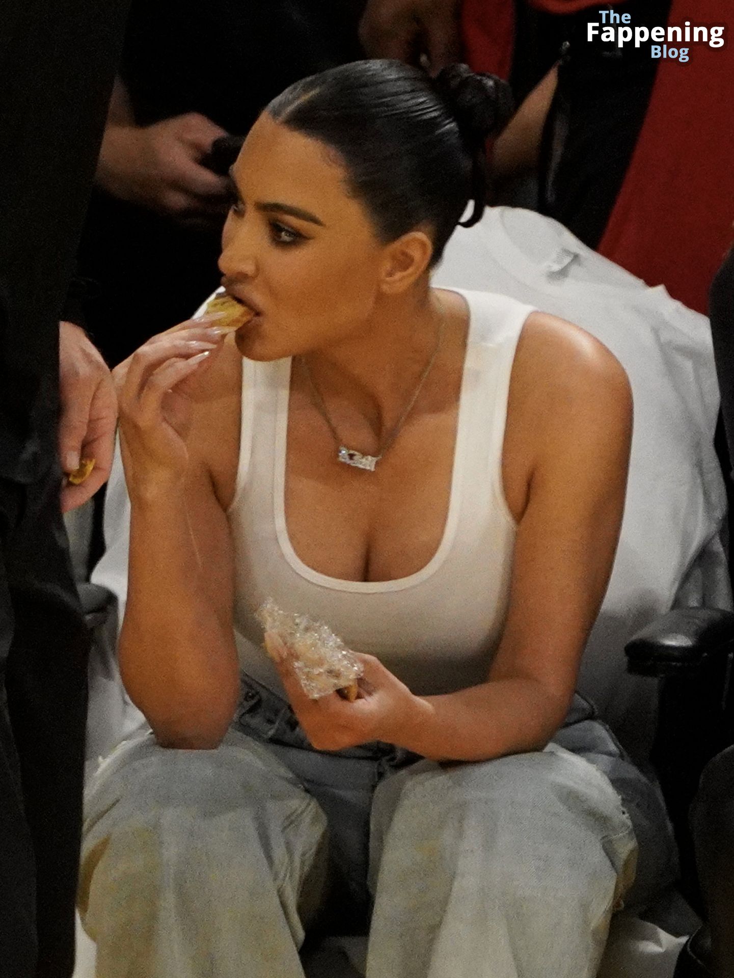 Kim Kardashian Displays Her Cleavage at the NBA Playoffs Between.jpg