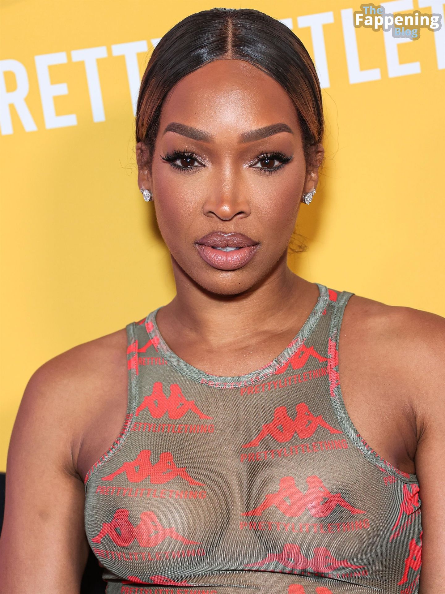 Malika Haqq Flashes Her Nude Boobs at the PrettyLittleThing X.jpg