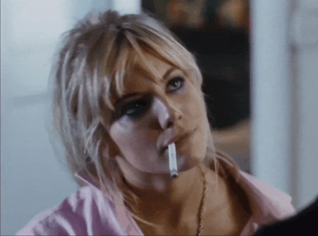 Sienna Miller making smoking great again in 04 Alfie.gif