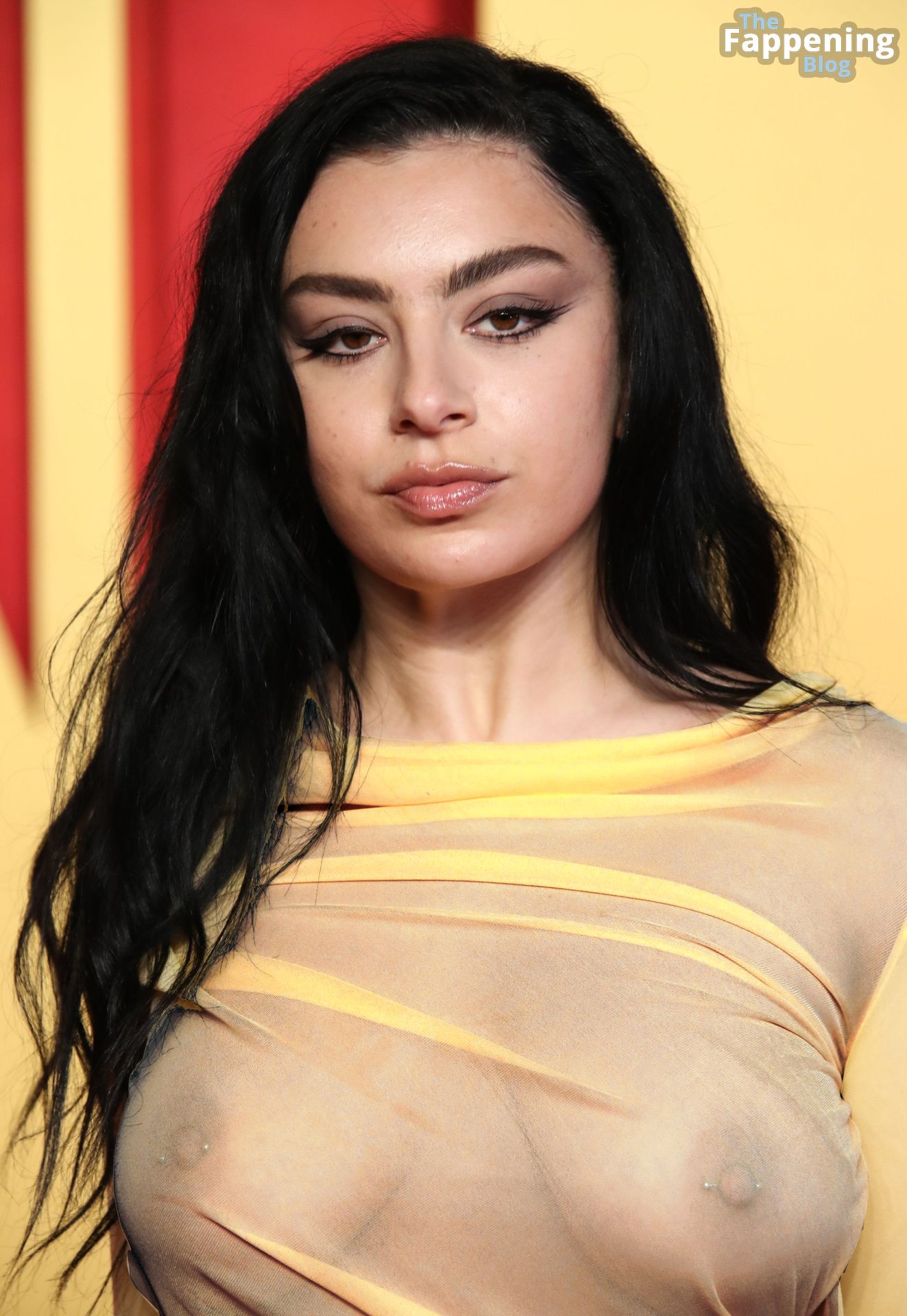 Charli XCX Displays Her Nude Tits at the 2024 Vanity.jpg