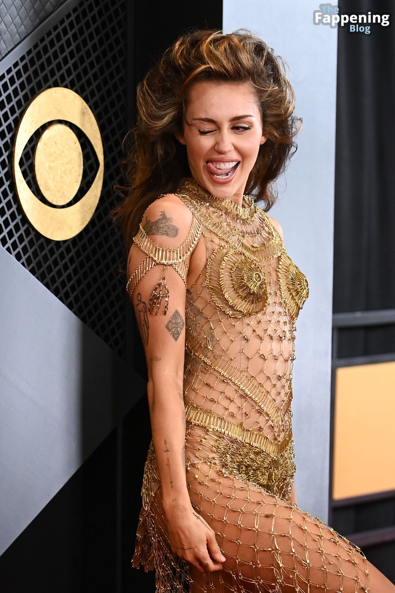 Miley Cyrus Looks Hot Without Underwear at the 66th Annual.jpg