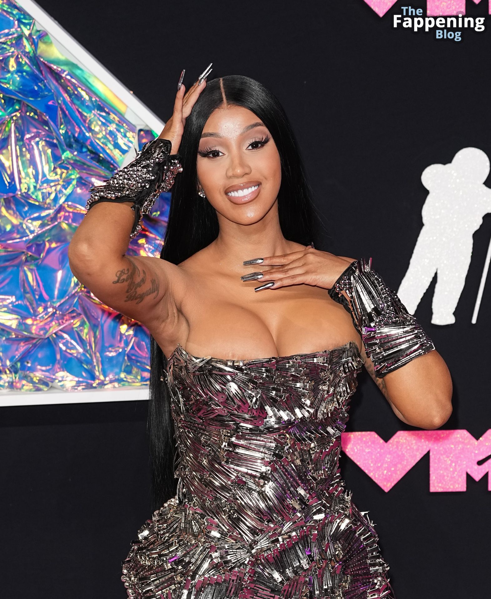 Cardi B Shows Off Nice Cleavage and Flashes Areolas at.jpeg