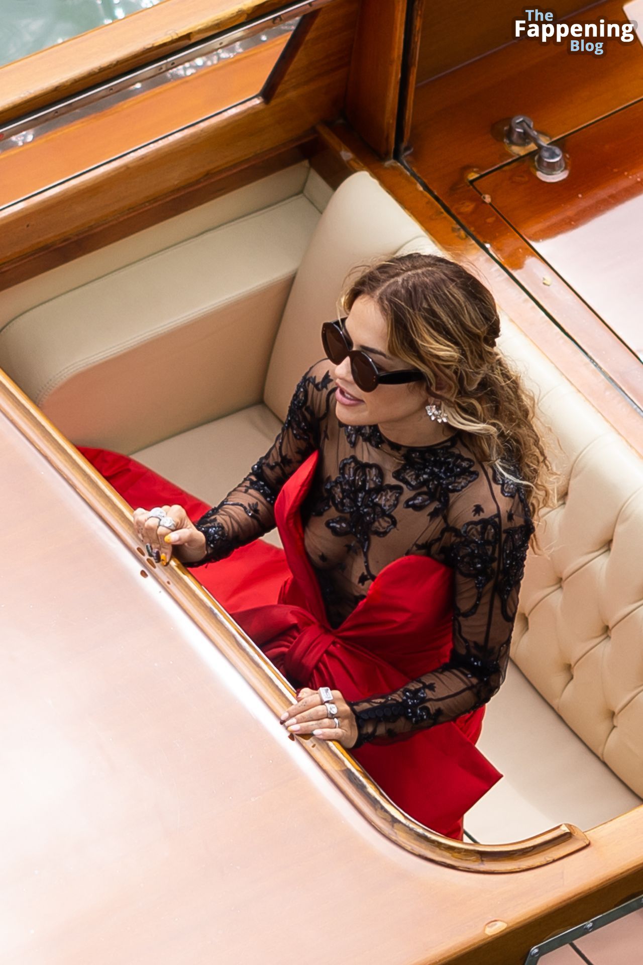 Rita Ora Flaunts Her Boobs and a Long Moschino Red.jpeg