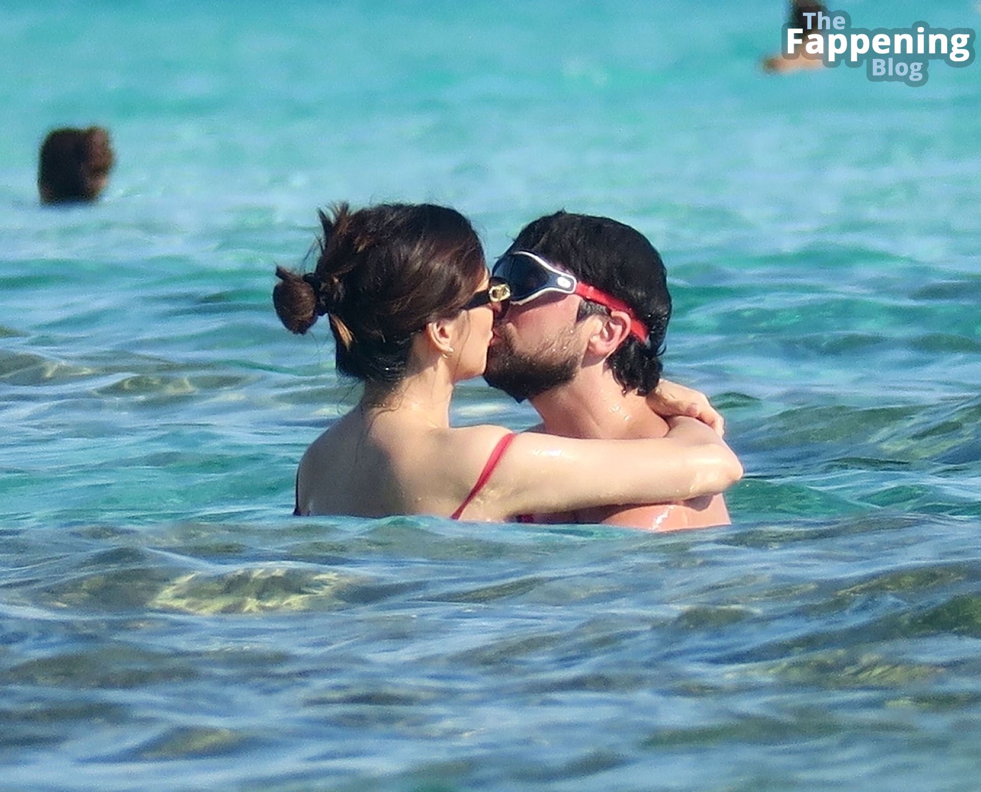 Gemma Chan Dominic Cooper Lock Lips During Their Holiday.jpg