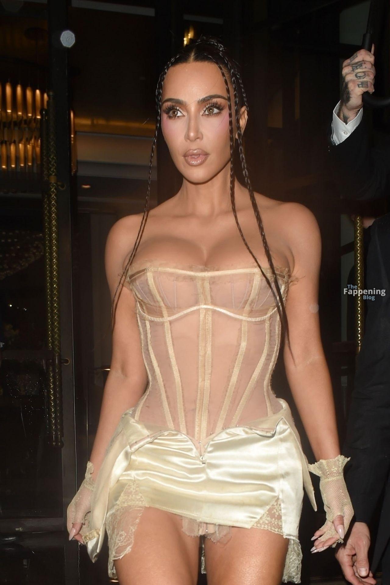 Kim Kardashian Stuns in a White Corset Look in London.jpg