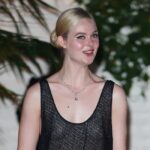 Elle Fanning shows tits