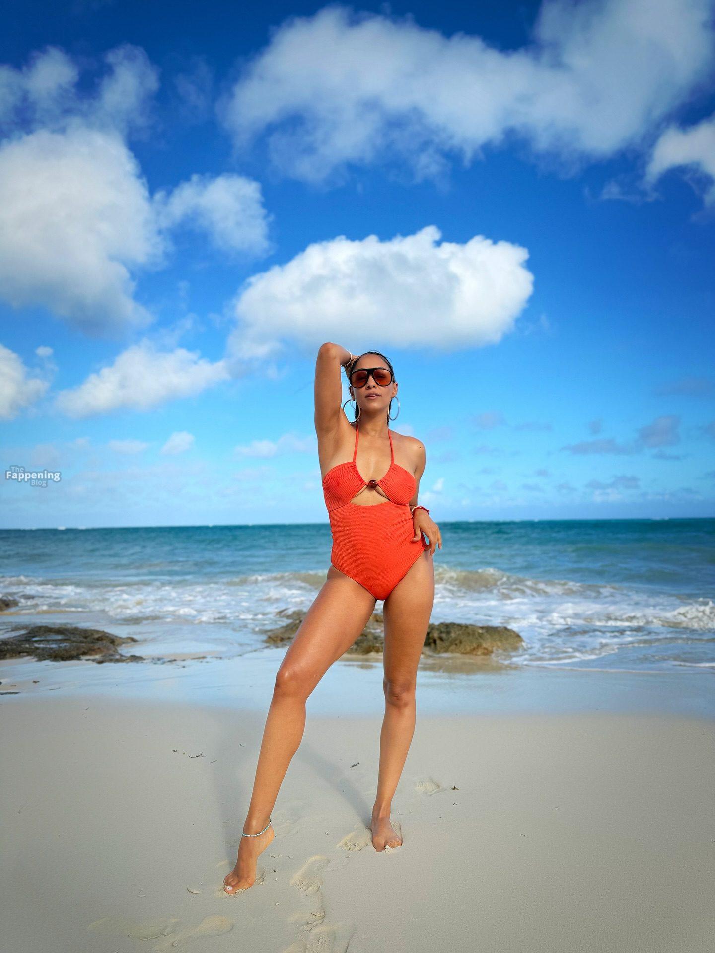 Tia Mowry Shows Off Her Sexy Figure in a Swimsuit.jpg