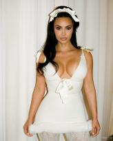 Kim Kardashian Shows Off Her Goods in a Holiday Event.jpg