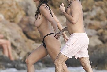 Heidi Klum nude on a beach
