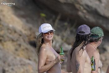 Heidi Klum nude on a beach