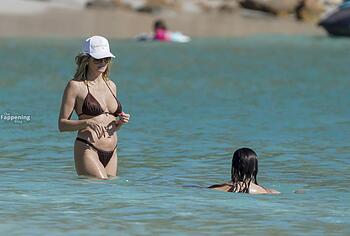 Heidi Klum nude on a beach