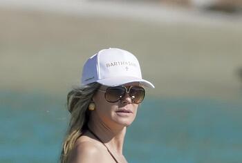 Heidi Klum nude on a beach