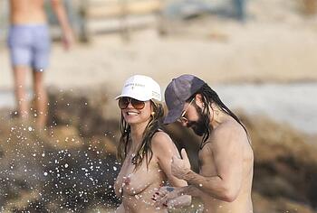 Heidi Klum nude on a beach