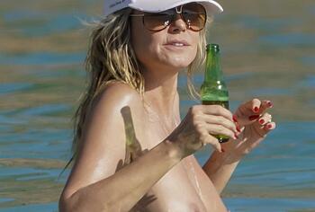 Heidi Klum nude on a beach