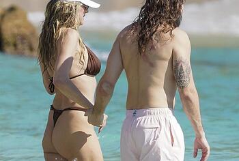 Heidi Klum nude on a beach