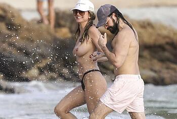 Heidi Klum nude on a beach