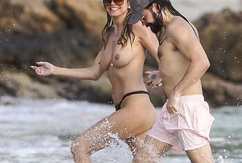 Heidi Klum nude on a beach