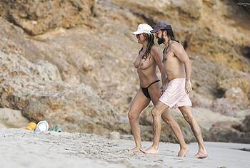 Heidi Klum nude on a beach