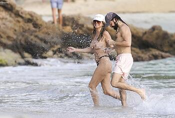 Heidi Klum nude on a beach