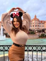 Maddalena Cabizzosu Shows Off Her Goods at Disneyland in Paris.jpg