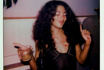 Olivia Dean Nude Tits and Bikini Pics