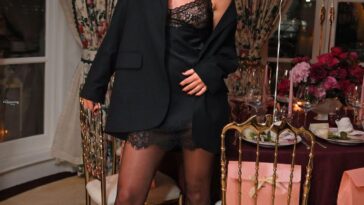 Lily James Flaunts Her Stunning Figure in Black Negligee at The Dorchester (7 Photos)