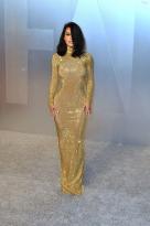 Kim Kardashian Looks Hot in a Gold Dress at the.jpg