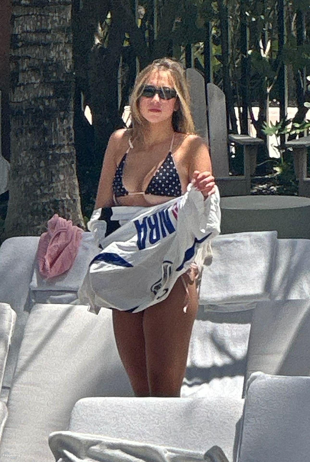 Tate McRae Shows Off Her Assets in a Blue String.jpg